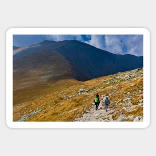 Mother and son hiking into the mountains Sticker